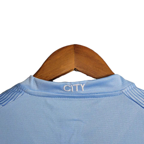 Kit Infantil Manchester City I Puma 23/24 - Azul